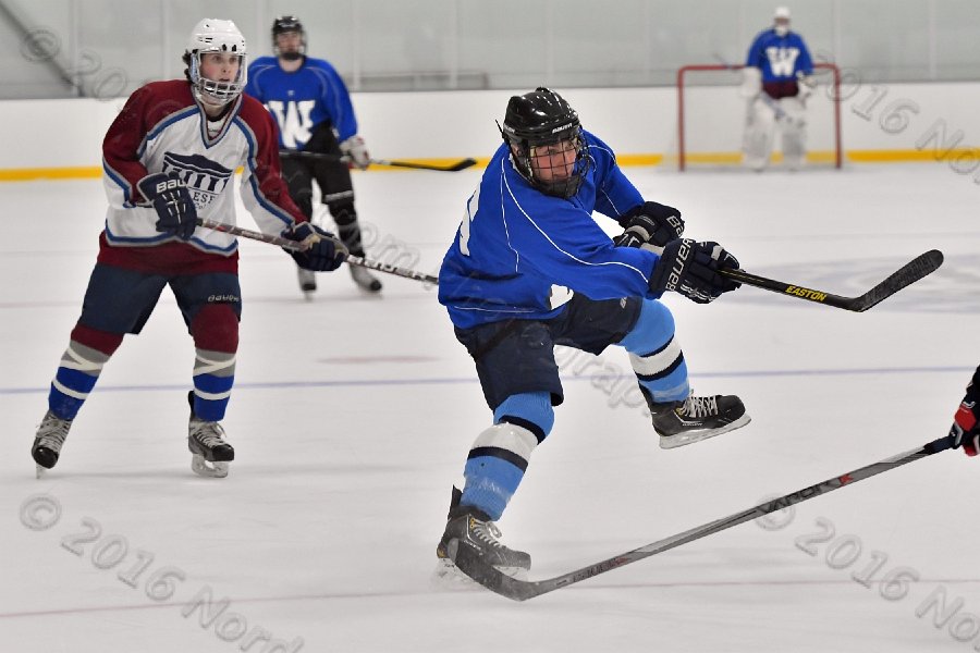 Wheaton College Men\'s Ice Hockey vs Middlesex Community College. - Photo By: KEITH NORDSTROM